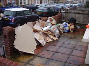 Cardboard and debris on driveway