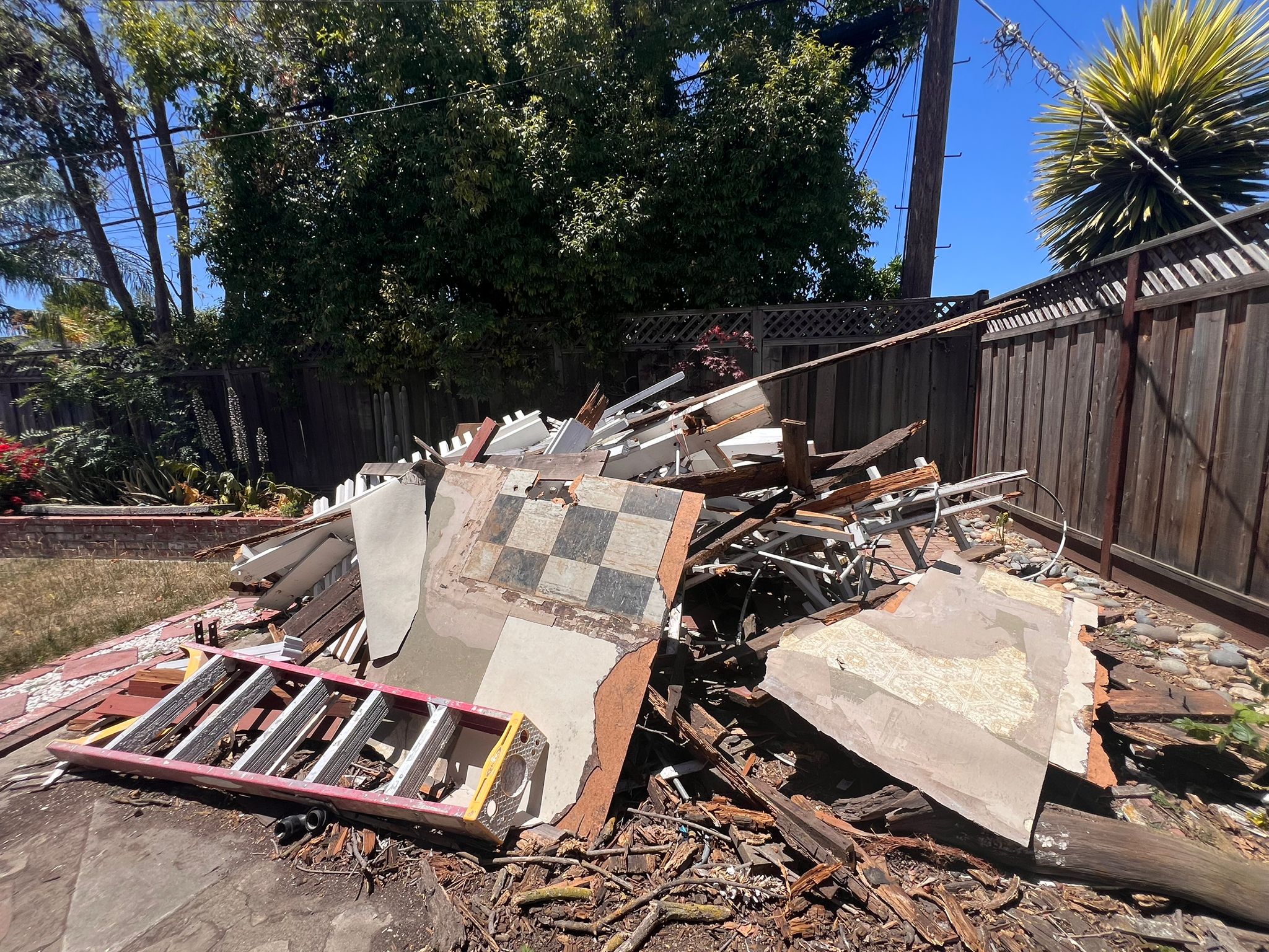 Demolition debris in backyard
