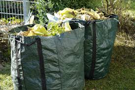 Green waste bags in garden